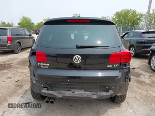 2013 Volkswagen Tiguan S with VIN WVGAV3AX2DW594334, listed as a IAAI auction lot 42405989 with 96,559 mi miles and . Bid and sale history available at DreamBid. Image 16.