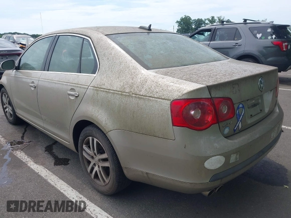 2006 Volkswagen Jetta 2.5L z VIN 3VWSF71K76M750076, wystawiony jako IAAI lot #42769137 z przebiegiem 99 114 mil mil oraz . Historia ofert i sprzedaży dostępna na DreamBid. Obrazek 3.