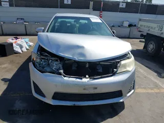 2013 Toyota Camry L with VIN 4T4BF1FKXDR313627, listed as a IAAI auction lot 41855022 with 128,782 mi miles. Bid and sale history available at carsss.com. Image 12.