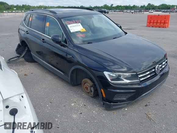 2018 Volkswagen Tiguan SEL with VIN 3VV3B7AX2JM049650, listed as a IAAI auction lot 42169314 with Not Provided miles and . Bid and sale history available at DreamBid. Image 1.