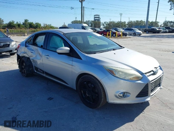 2012 Ford Focus SE with VIN 1FAHP3F23CL265724, listed as a IAAI auction lot 41184121 with 216,873 mi miles. Bid and sale history available at carsss.com. Image 1.