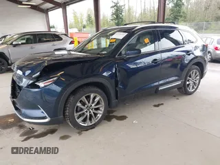 2018 Mazda CX-9 Grand Touring with VIN JM3TCBDY0J0216195, listed as a IAAI auction lot 41976122 with 90,083 mi miles and . Bid and sale history available at DreamBid. Image 17.