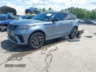 2020 Land Rover Range Rover Velar z VIN SALYU2EE1LA258140, wystawiony jako IAAI lot #42326439 z przebiegiem 61 827 mil mil oraz . Historia ofert i sprzedaży dostępna na DreamBid. Obrazek 17.