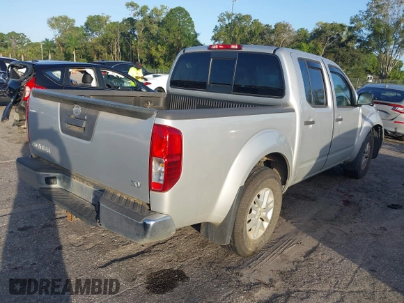 2019 Nissan Frontier SV with VIN 1N6AD0ER4KN718007, listed as a IAAI auction lot 40731045 with 125,665 mi miles and . Bid and sale history available at DreamBid. Image 4.