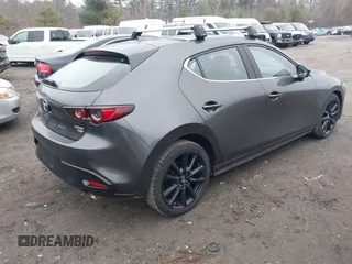 2021 Mazda 3 2.5 Turbo with VIN JM1BPBJY9M1340476, listed as a IAAI auction lot 41921955 with 43,486 mi miles. Bid and sale history available at carsss.com. Image 4.