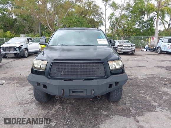 2011 Toyota Tundra 2WD Truck SR with VIN 5TFTY5F14BX007238, listed as a IAAI auction lot 41663289 with 126,499 mi miles. Bid and sale history available at carsss.com. Image 12.