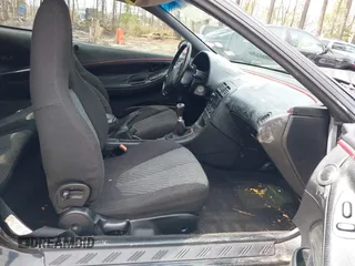 1995 Ford Probe z VIN 1ZVLT22B1S5104093, wystawiony jako IAAI lot #41744654 z przebiegiem 166 253 mil mil oraz . Historia ofert i sprzedaży dostępna na DreamBid. Obrazek 5.