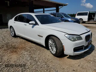 2013 BMW 7 Series 750Li with VIN WBAYE8C56DD132217, listed as a Copart auction lot 61976145 with 146,860 mi miles and Salvage title. Bid and sale history available at DreamBid. Image 4.