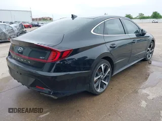 2021 Hyundai Sonata SEL Plus with VIN 5NPEJ4J25MH107242, listed as a IAAI auction lot 39029018 with 48,160 mi miles and . Bid and sale history available at DreamBid. Image 4.