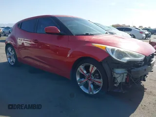 2013 Hyundai Veloster w/Black Int with VIN KMHTC6AD3DU097780, listed as a IAAI auction lot 42497359 with 95,345 mi miles and . Bid and sale history available at DreamBid. Image 1.