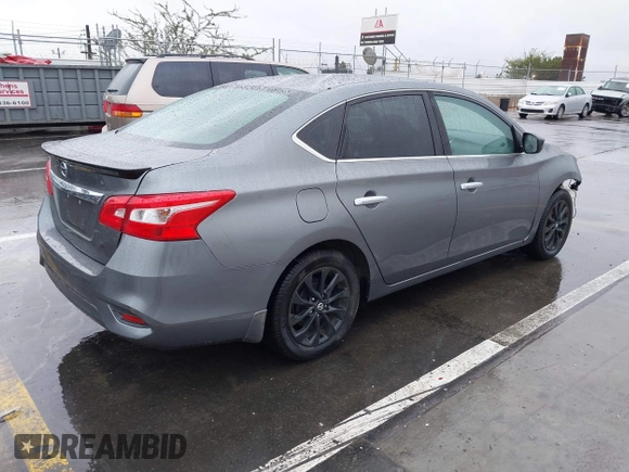 2018 Nissan Sentra S with VIN 3N1AB7AP0JY244535, listed as a IAAI auction lot 41573436 with 150,919 mi miles and . Bid and sale history available at DreamBid. Image 4.