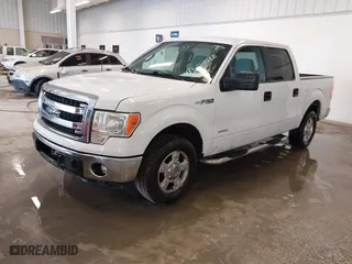 2013 Ford F-150 XL with VIN 1FTFW1CTXDFA62013, listed as a IAAI auction lot 41645531 with 185,555 mi miles. Bid and sale history available at carsss.com. Image 2.