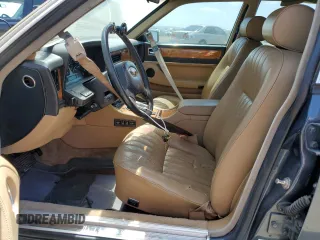 1992 Jaguar XJ with VIN SAJHY174XNC649368, listed as a Copart auction lot 50191454 with 99,553 mi miles and Salvage Title. Bid and sale history available at DreamBid. Image 7.