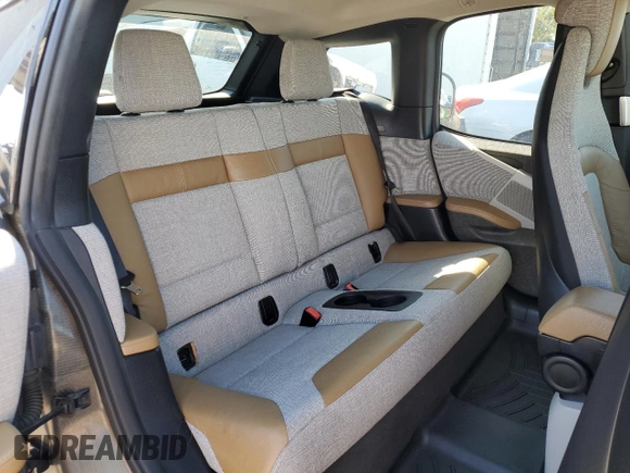2015 BMW i3 z VIN WBY1Z2C56FV555588, wystawiony jako Copart lot #48773145 z przebiegiem 58 130 mil mil oraz Szkoda całkowita • Salvage title. Historia ofert i sprzedaży dostępna na DreamBid. Obrazek 11.