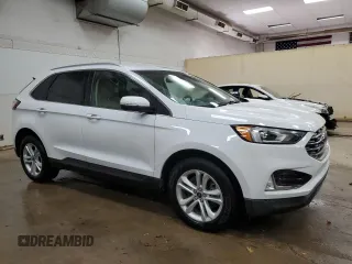 2020 Ford Edge SEL z VIN 2FMPK4J90LBB13748, wystawiony jako Copart lot #65687415 z przebiegiem 108 629 mil mil oraz Czysty tytuł • Clean title. Historia ofert i sprzedaży dostępna na DreamBid. Obrazek 4.