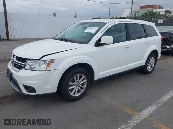 2015 Dodge Journey SXT with VIN 3C4PDDBG9FT606686, listed as a IAAI auction lot 42048201 with 107,593 mi miles and . Bid and sale history available at DreamBid. Image 2.