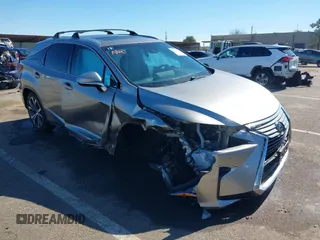 2018 Lexus RX 350 z VIN 2T2BZMCA7JC140852, wystawiony jako IAAI lot #41669823 z przebiegiem 56 306 mil mil oraz . Historia ofert i sprzedaży dostępna na DreamBid. Obrazek 6.