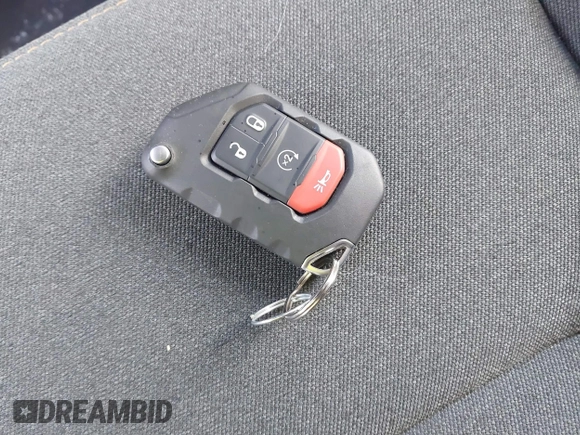 2024 Jeep Wrangler Sport S with VIN 1C4PJXDN2RW306332, listed as a IAAI auction lot 41036573 with 1,785 mi miles and . Bid and sale history available at DreamBid. Image 11.