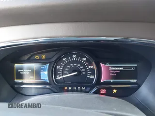 2015 Lincoln Navigator z VIN 5LMJJ3JT3FEJ09214, wystawiony jako IAAI lot #41682213 z przebiegiem 133 997 mil mil oraz . Historia ofert i sprzedaży dostępna na DreamBid. Obrazek 7.