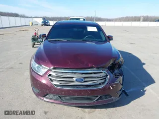 2018 Ford Taurus SEL with VIN 1FAHP2E84JG113599, listed as a IAAI auction lot 41526343 with 105,798 mi miles. Bid and sale history available at carsss.com. Image 13.