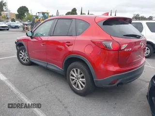2016 Mazda CX-5 Touring with VIN JM3KE2CY3G0877185, listed as a IAAI auction lot 41729243 with 144,656 mi miles. Bid and sale history available at carsss.com. Image 3.