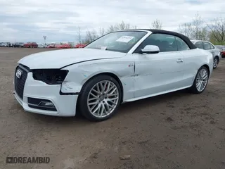 2015 Audi S5 Premium Plus with VIN WAUCGAFH2FN009433, listed as a IAAI auction lot 42034153 with 104,859 mi miles. Bid and sale history available at carsss.com. Image 2.