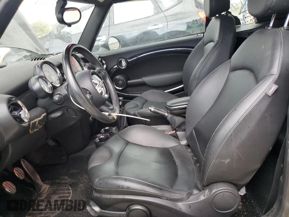 2014 MINI Convertible S with VIN WMWZP3C53ET298154, listed as a Copart auction lot 53971615 with 85,499 mi miles and Salvage title. Bid and sale history available at DreamBid. Image 7.