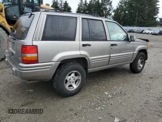 1997 Jeep Grand Cherokee Limited with VIN 1J4GZ78Y4VC693193, listed as a Copart auction lot 46327885 with 235,553 mi miles and Salvage Title. Bid and sale history available at carsss.com. Image 3.