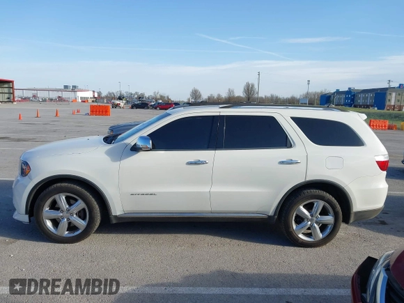 2011 Dodge Durango Citadel with VIN 1D4SE5GT0BC686083, listed as a IAAI auction lot 41805770 with 171,879 mi miles. Bid and sale history available at carsss.com. Image 14.