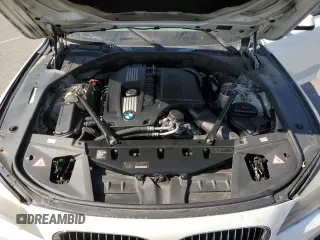 2012 BMW 7 Series 740Li with VIN WBAKB4C55CC575826, listed as a Copart auction lot 74012564 with 140,577 mi miles and Salvage Title. Bid and sale history available at carsss.com. Image 13.