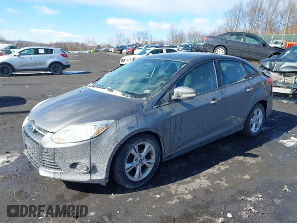 2013 Ford Focus SE with VIN 1FADP3F24DL288221, listed as a IAAI auction lot 41646815 with 169,617 mi miles. Bid and sale history available at carsss.com. Image 2.