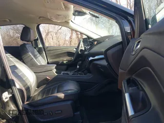 2017 Ford Escape Titanium with VIN 1FMCU0J94HUD58815, listed as a IAAI auction lot 41455415 with 80,421 mi miles and . Bid and sale history available at DreamBid. Image 5.