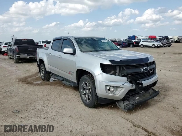 2018 Chevrolet Colorado 4WD Z71 z VIN 1GCGTDEN7J1125445, wystawiony jako Copart lot #53867035 z przebiegiem 101 681 mil mil oraz Szkoda całkowita • Salvage title. Historia ofert i sprzedaży dostępna na DreamBid. Obrazek 13.