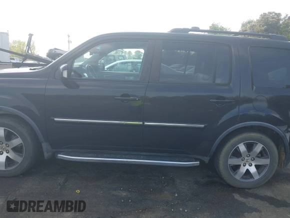 2012 Honda Pilot Touring with VIN 5FNYF4H95CB026191, listed as a IAAI auction lot 42021987 with 229,273 mi miles and . Bid and sale history available at DreamBid. Image 14.