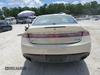 2014 Lincoln MKZ with VIN 3LN6L2G96ER817767, listed as a Copart auction lot 56537015 with 127,373 mi miles and Salvage title. Bid and sale history available at DreamBid. Image 6.