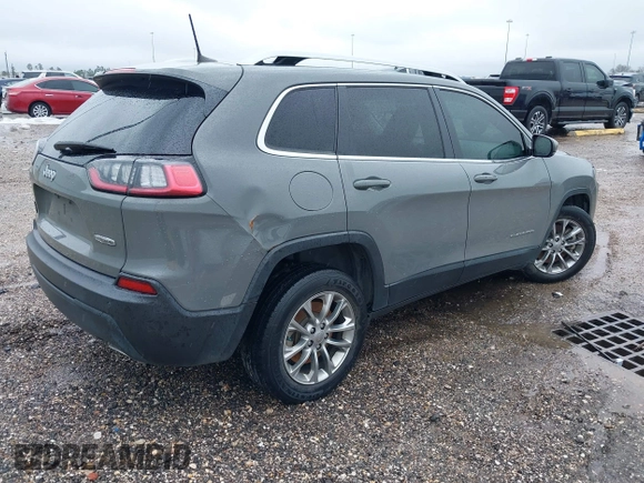 2021 Jeep Cherokee Latitude Lux with VIN 1C4PJLMXXMD203934, listed as a IAAI auction lot 41548713 with 64,746 mi miles. Bid and sale history available at carsss.com. Image 4.