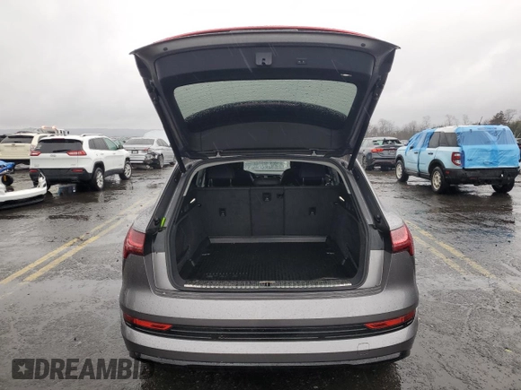 2021 Audi e-tron Premium Plus with VIN WA1LAAGEXMB017927, listed as a Copart auction lot 83877554 with 54,348 mi miles and Salvage Title. Bid and sale history available at DreamBid. Image 6.