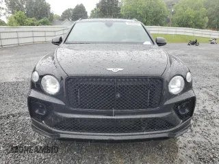 2022 Bentley Bentayga V8 z VIN SJAAM2ZV8NC039607, wystawiony jako Copart lot #54888564 z przebiegiem 15 561 mil mil oraz . Historia ofert i sprzedaży dostępna na DreamBid. Obrazek 5.
