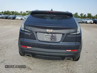 2022 Cadillac XT4 FWD Sport z VIN 1GYFZER45NF156035, wystawiony jako Copart lot #65836294 z przebiegiem 62 443 mil mil oraz Szkoda całkowita • Salvage title. Historia ofert i sprzedaży dostępna na DreamBid. Obrazek 6.