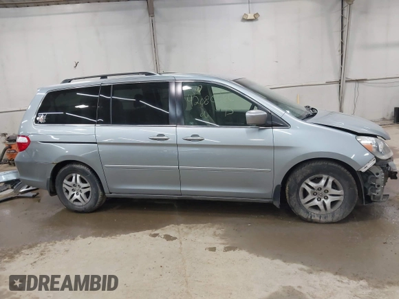 2006 Honda Odyssey EX with VIN 5FNRL38446B044231, listed as a IAAI auction lot 42080586 with 211,908 mi miles. Bid and sale history available at carsss.com. Image 13.