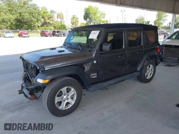 2020 Jeep Wrangler Unlimited Sport S with VIN 1C4HJXDN9LW167442, listed as a IAAI auction lot 42308617 with 59,335 mi miles and . Bid and sale history available at DreamBid. Image 2.