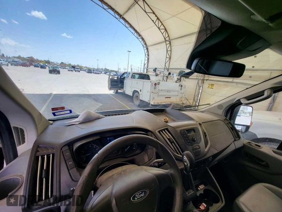 2017 Ford Transit with VIN 1FTYE1YMXHKA68372, listed as a IAAI auction lot 42845755 with 196,426 mi miles and . Bid and sale history available at DreamBid. Image 26.