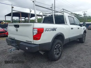 2017 Nissan Titan XD PRO-4X with VIN 1N6BA1F47HN517135, listed as a IAAI auction lot 41605323 with 108,984 mi miles. Bid and sale history available at carsss.com. Image 4.
