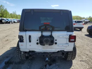 2018 Jeep Wrangler Unlimited Sport S with VIN 1C4HJXDN4JW240844, listed as a Copart auction lot 55578405 with 70,369 mi miles and Salvage title. Bid and sale history available at DreamBid. Image 6.
