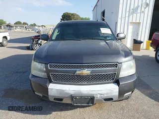 2011 Chevrolet Suburban LT with VIN 1GNSKJE34BR242629, listed as a IAAI auction lot 42043276 with 197,722 mi miles. Bid and sale history available at carsss.com. Image 12.