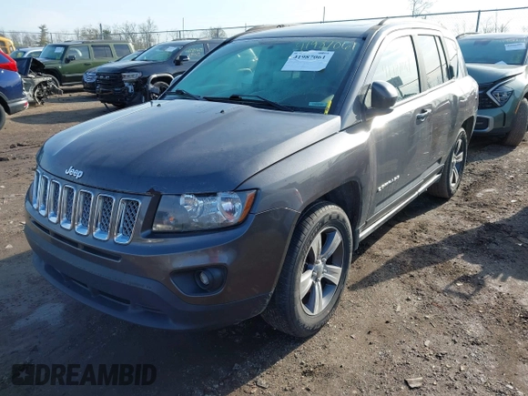 2016 Jeep Compass High Altitude Edition with VIN 1C4NJCEA1GD720030, listed as a IAAI auction lot 41987061 with 167,872 mi miles. Bid and sale history available at carsss.com. Image 2.