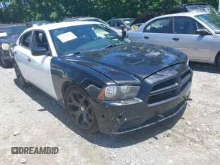 2014 Dodge Charger Police z VIN 2C3CDXAT2EH362082, wystawiony jako IAAI lot #42324684 z przebiegiem 147 336 mil mil oraz . Historia ofert i sprzedaży dostępna na DreamBid. Obrazek 1.