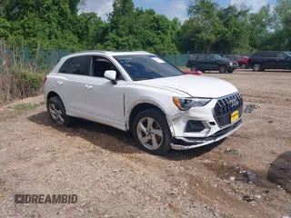 2021 Audi Q3 Premium with VIN WA1AUCF30M1060284, listed as a IAAI auction lot 42191588 with 71,571 mi miles and . Bid and sale history available at DreamBid. Image 1.