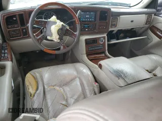2004 Cadillac Escalade z VIN 1GYEC63T04R107597, wystawiony jako Copart lot #87259974 z przebiegiem Nie podano mil oraz Nie do naprawy • Non repairable. Historia ofert i sprzedaży dostępna na DreamBid. Obrazek 8.