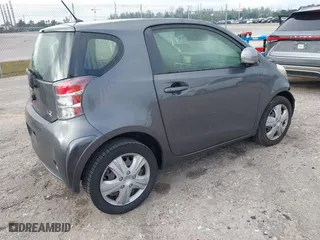 2014 Scion iQ with VIN JTNJJXB03EJ030212, listed as a IAAI auction lot 41091281 with 78,667 mi miles. Bid and sale history available at carsss.com. Image 4.